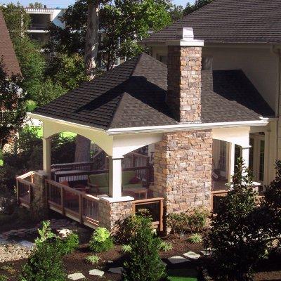 Covered patio with stone chimney